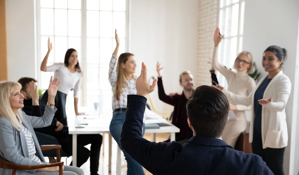 a group of professionals in a change management meeting