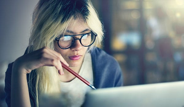 a student studying using laptop